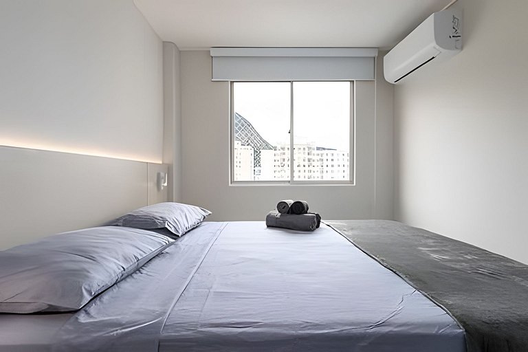 Quarto e sala com vista incrível